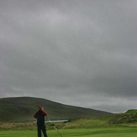 The 10th green underneath an overcast sky. Shetland Open 2006.